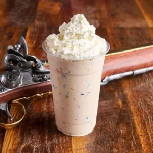 Swirled ice cream with mix-ins and toppings.