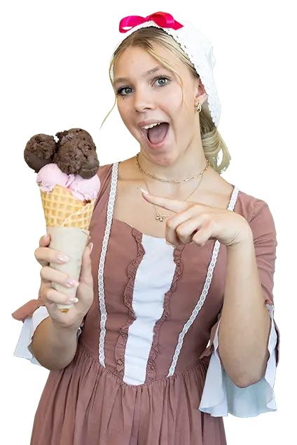 A server at Brooker's Founding Flavors Ice Cream holds an ice cream cone.