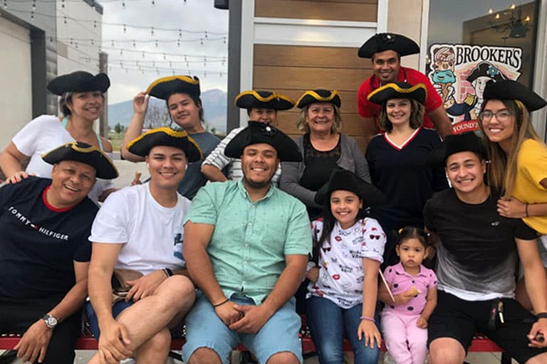 Brooker's Founding Flavors Ice Cream customers in colonial outfits eating ice cream